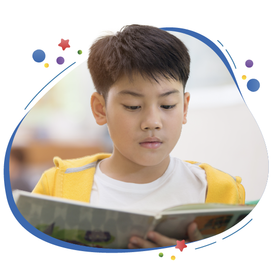 Literacy Skills Practice: A child reads intently.
